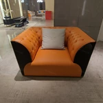 Orange & Black Leather Sofa Set with Tufted Detailing, Natural Wood Veneer Accents & Gold Stainless Steel Hardware